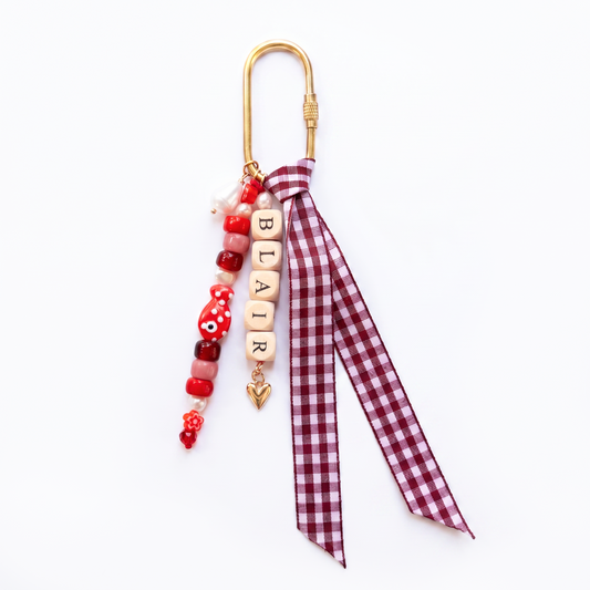 The Cranberry Ribbon Bag Charm